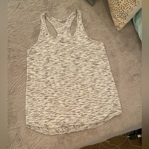 Lululemon workout tank. Size 8. Excellent condition. Gray/White color.